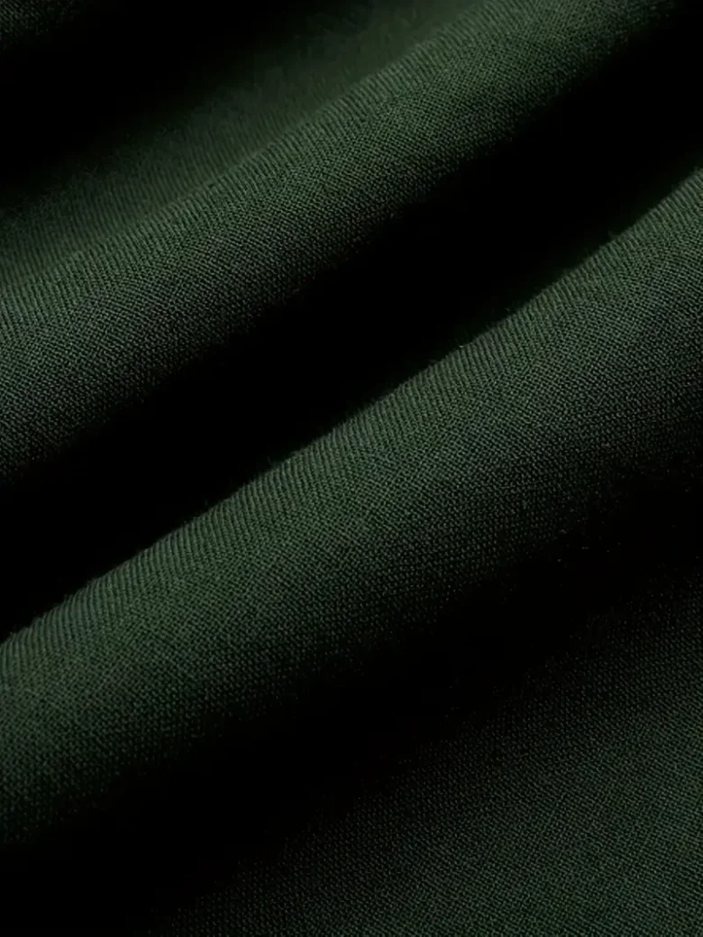 zielony materiał sukni balowej koronki
