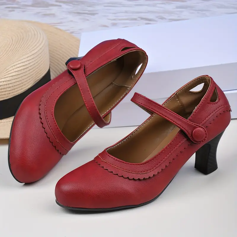 czerwone retro buty dla kobiet w białym pomieszczeniu