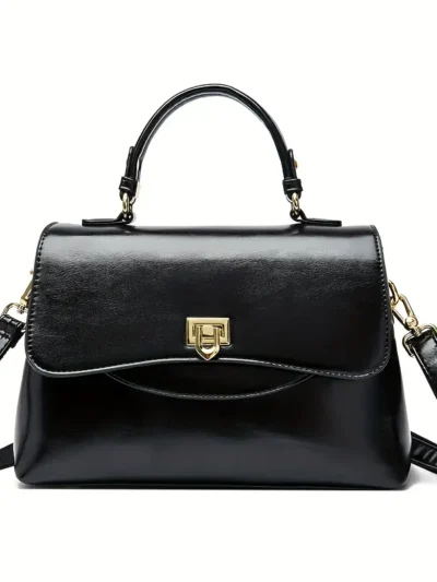 elegancka czarna torebka vintage skórzana na białym tle