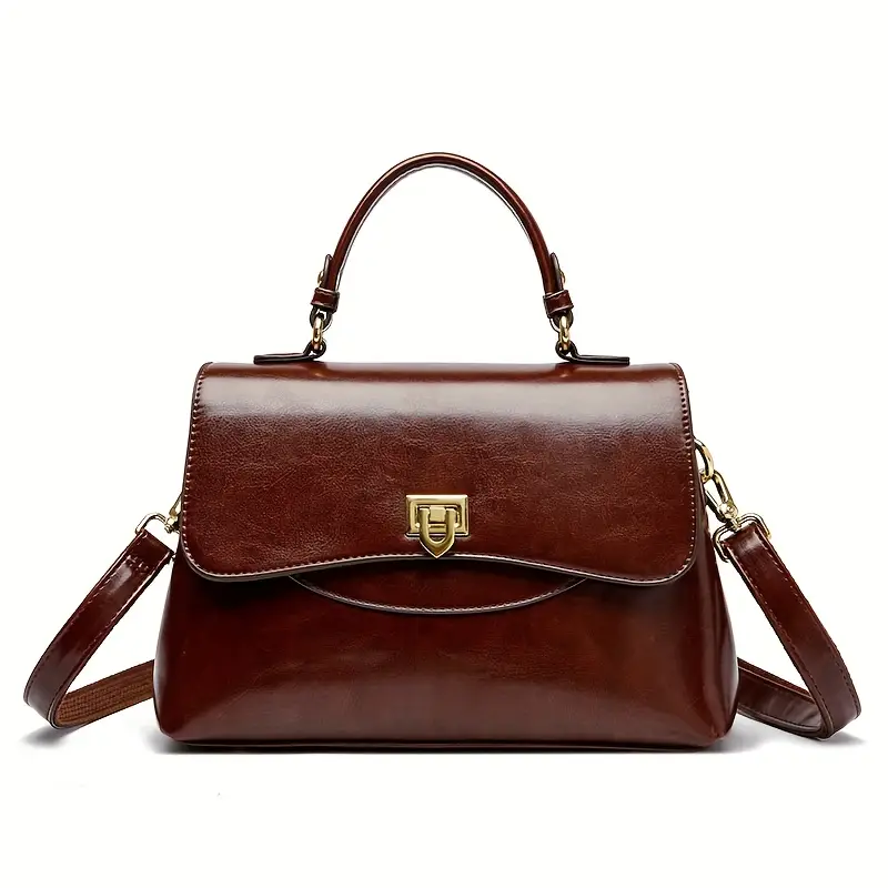 brązowa elegancka torebka vintage skórzana na białym tle