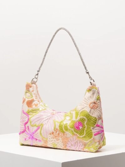 kolorowa torebka vintage z łańcuszkiem na białym tle